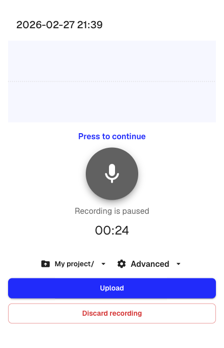 The paused recording view with upload and settings options